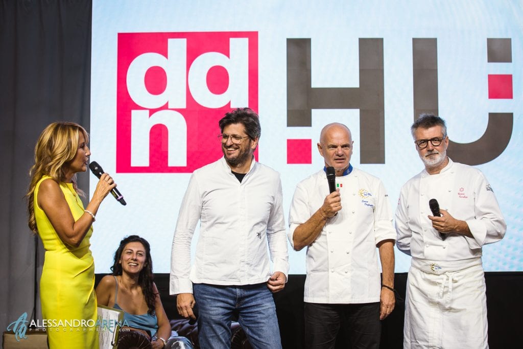 Gli chef  Tommaso Arrigoni, Enrico Derflingher e Gianni Tarabini sul palco